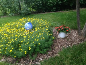 The garden seems like a great spot to sit and be idle.